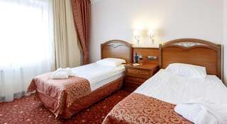 Гостиница Ринг Премьер Отель Ярославль Улучшенный двухместный номер с 2 отдельными кроватями-1